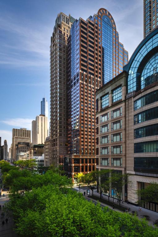 a city skyline with tall buildings in a city at Omni Chicago Hotel in Chicago
