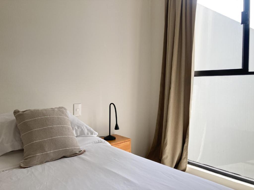 Letto o letti in una camera di Casa 821 Guest House