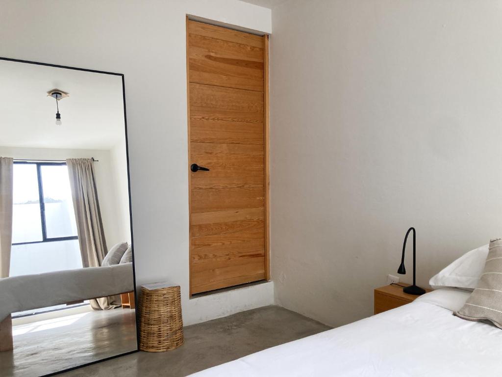 Letto o letti in una camera di Casa 821 Guest House