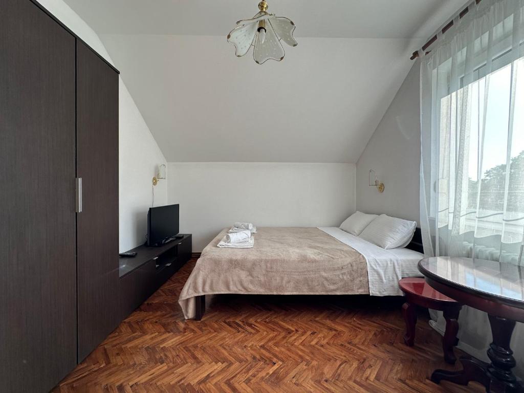 Postel nebo postele na pokoji v ubytování Pansion "Dušica"