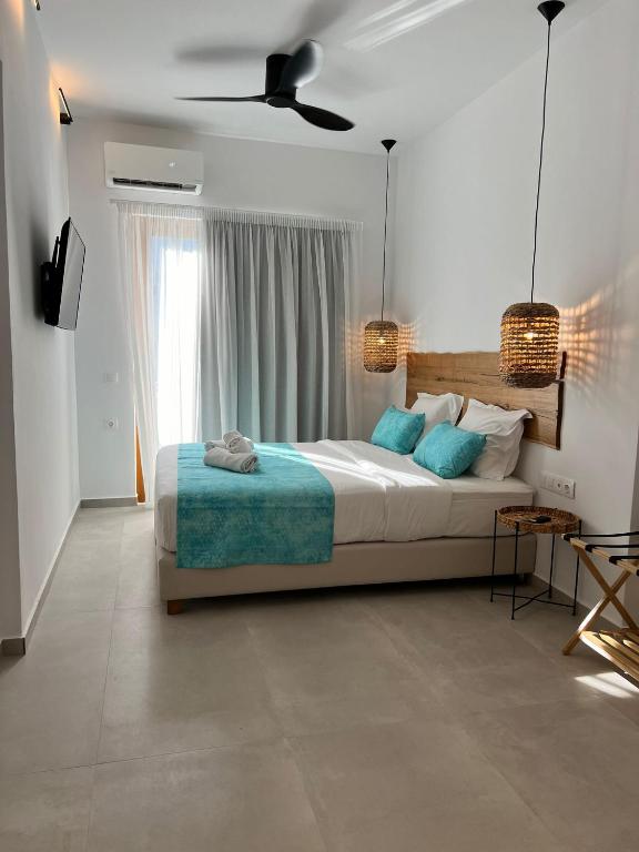 Postel nebo postele na pokoji v ubytování Zoe Boutique Hotel