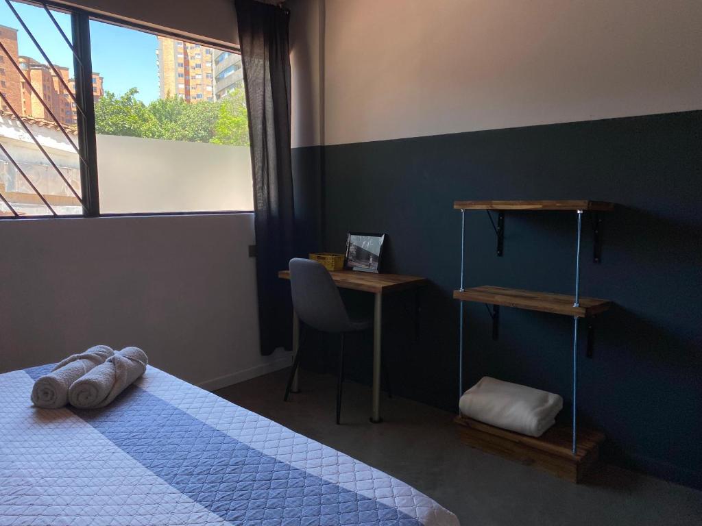 Postel nebo postele na pokoji v ubytování Casa Mosaiko Patio Bonito