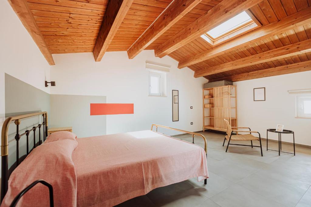 Postel nebo postele na pokoji v ubytování B&b VICO BOITO