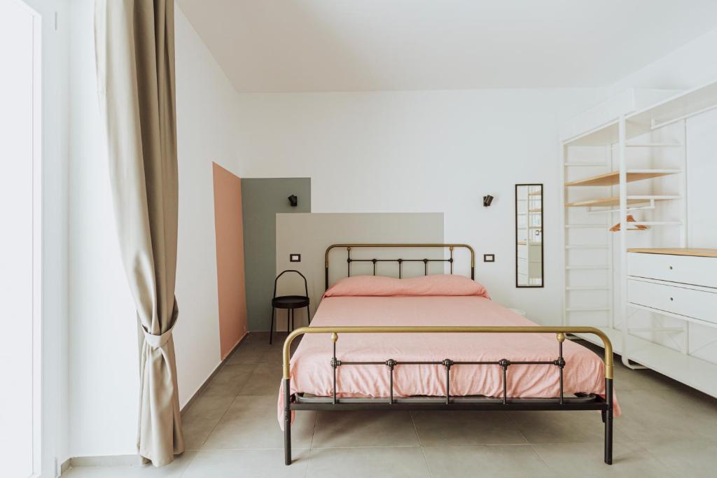 Postel nebo postele na pokoji v ubytování B&b VICO BOITO