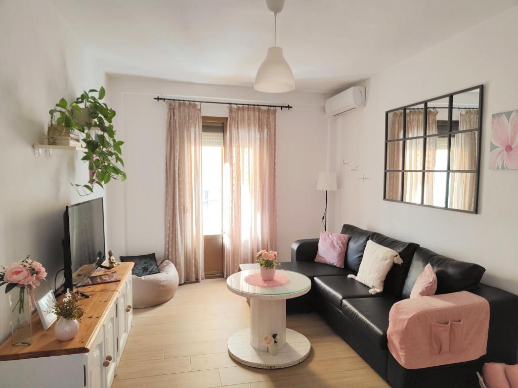 Et opholdsområde på Bonito piso céntrico con WIFI y terraza