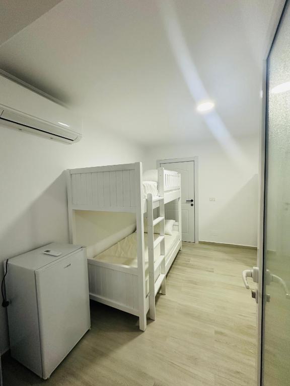 Postel nebo postele na pokoji v ubytování Aral Hostel