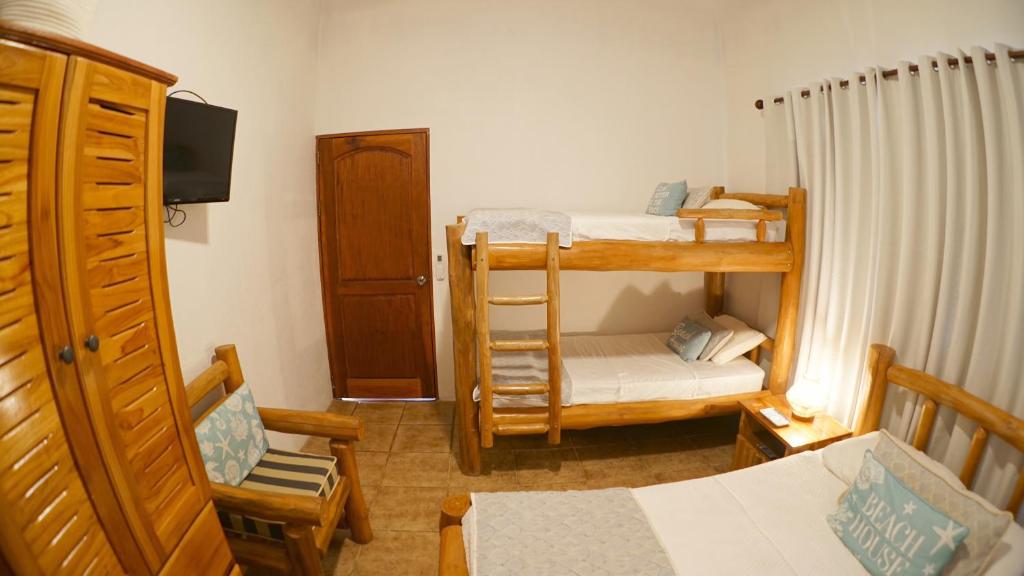 Postel nebo postele na pokoji v ubytování Villas Welcome to Heaven