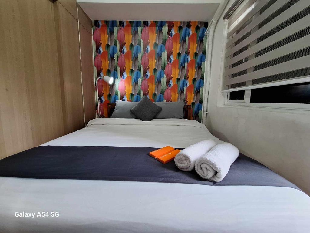 Cozy 1 Bed Unit WIFI in Grace Residences Taguig City