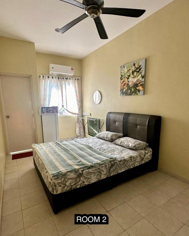 Postel nebo postele na pokoji v ubytování Tamu House Botani