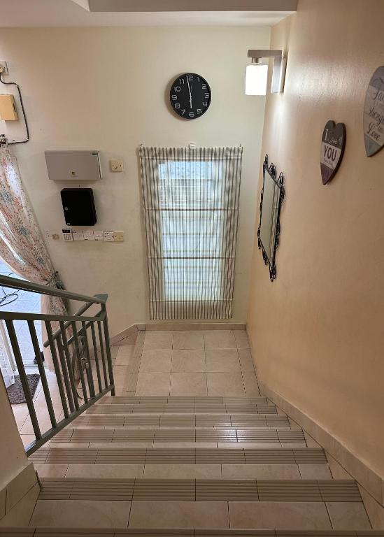 TV a/nebo společenská místnost v ubytování Tamu House Botani