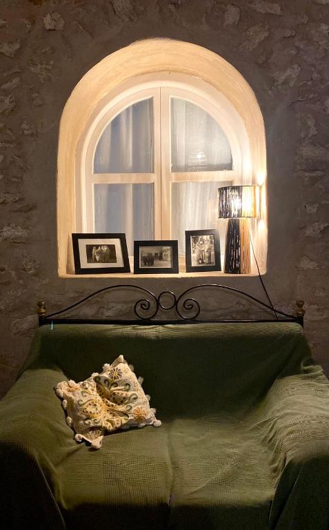 Postel nebo postele na pokoji v ubytování Adam house