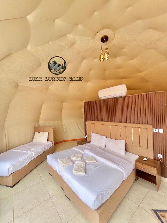 Postel nebo postele na pokoji v ubytování MIRA LUXURY CAMp