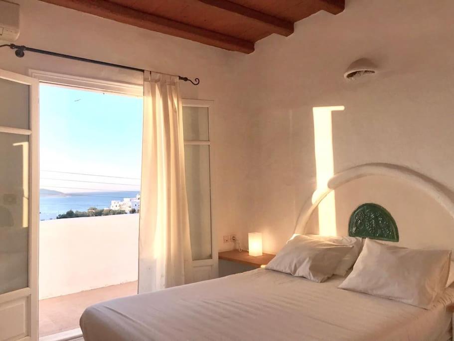 Ένα ή περισσότερα κρεβάτια σε δωμάτιο στο Naousa Seaview Retreat II