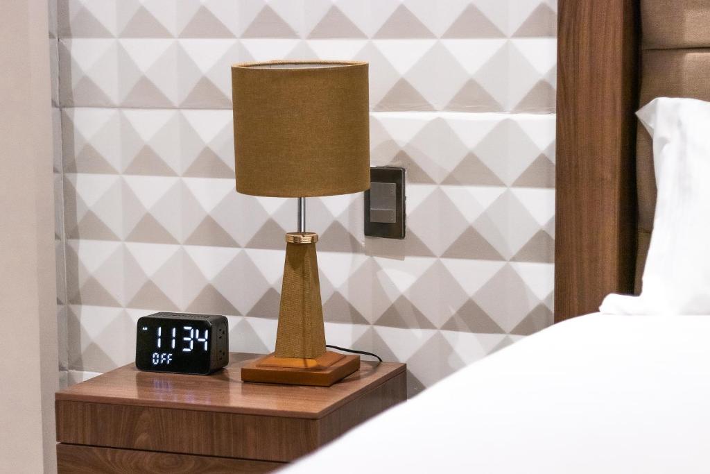 Postel nebo postele na pokoji v ubytování Hotel Arthemisa