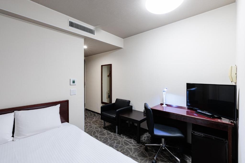 TV a/nebo společenská místnost v ubytování Hotel Silk Tree Nagoya