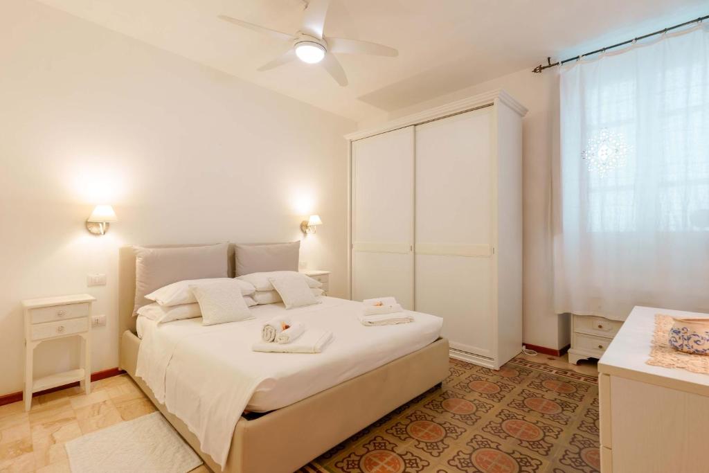Postel nebo postele na pokoji v ubytování Guest House Baruffi