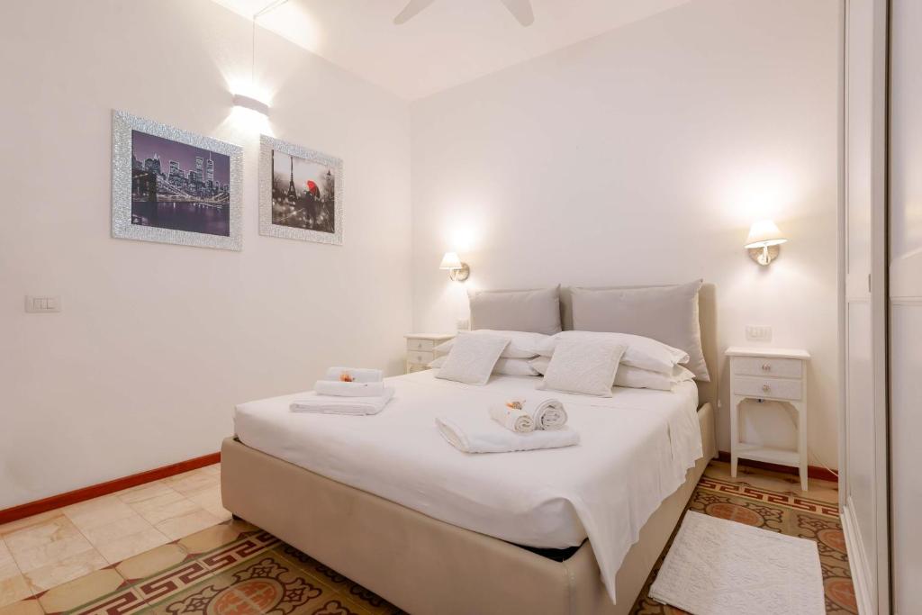 Postel nebo postele na pokoji v ubytování Guest House Baruffi