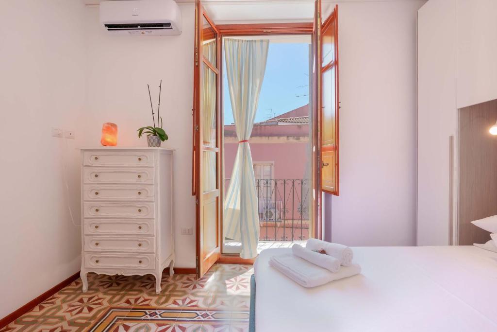 Postel nebo postele na pokoji v ubytování Guest House Baruffi