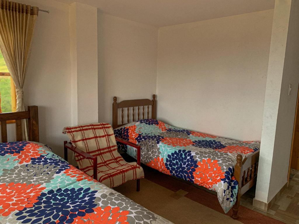 Postel nebo postele na pokoji v ubytování Casa Laurel