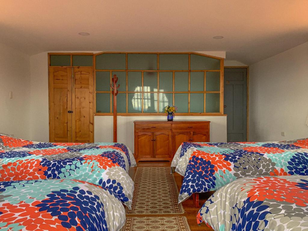 Postel nebo postele na pokoji v ubytování Casa Laurel