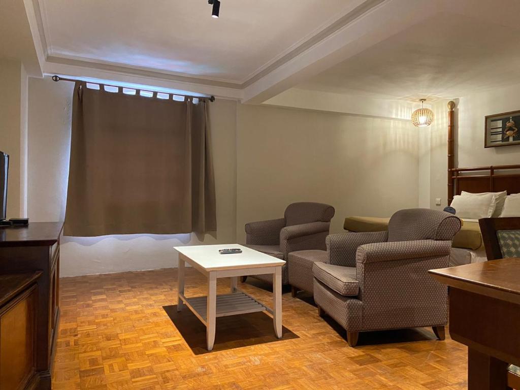 Posezení v ubytování The Little Star Studio Hotel- Star Regency