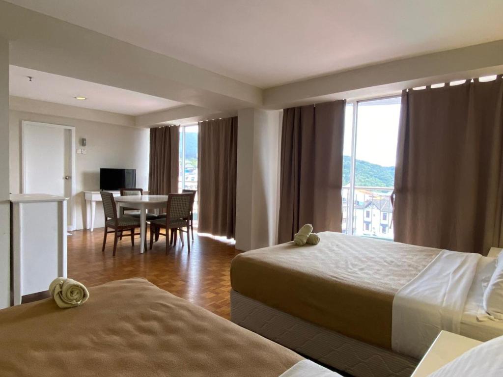 TV a/nebo společenská místnost v ubytování The Little Star Studio Hotel- Star Regency