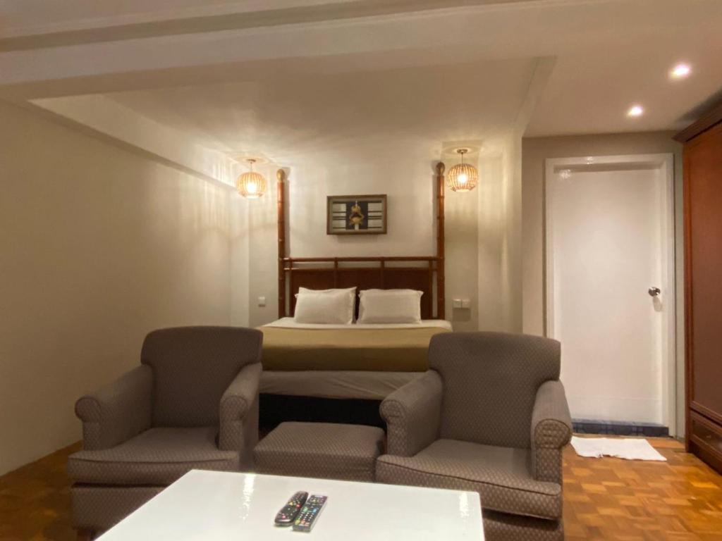 Posezení v ubytování The Little Star Studio Hotel- Star Regency