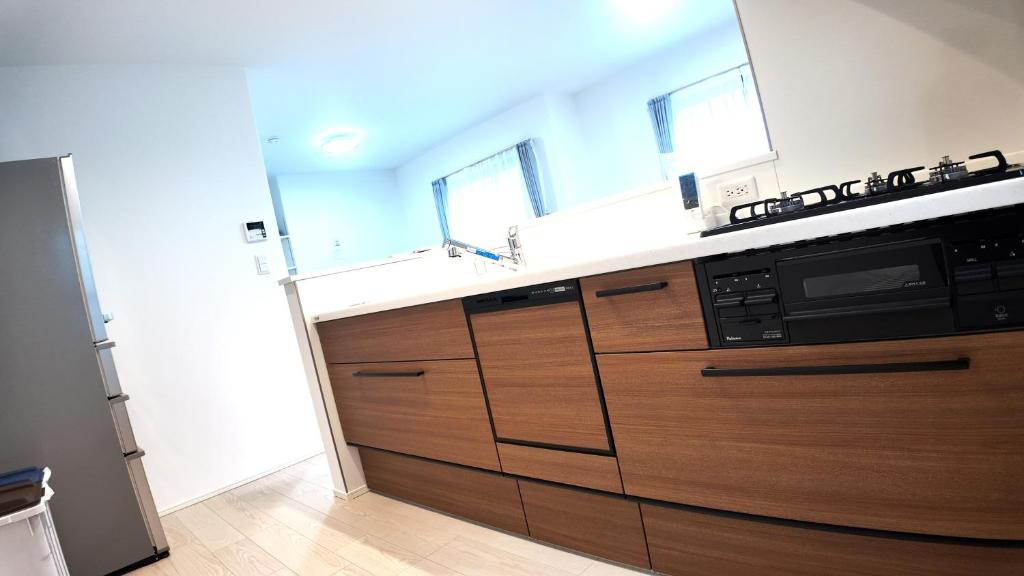 Kuchyň nebo kuchyňský kout v ubytování Daiichi House