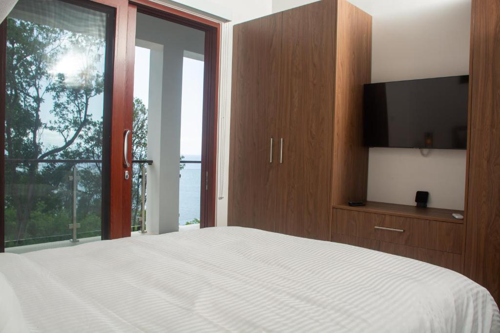 Postel nebo postele na pokoji v ubytování Villa Vino Lucia