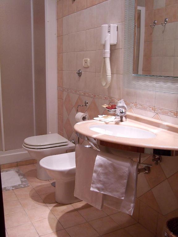 Koupelna v ubytování Hotel La Pace - Experience