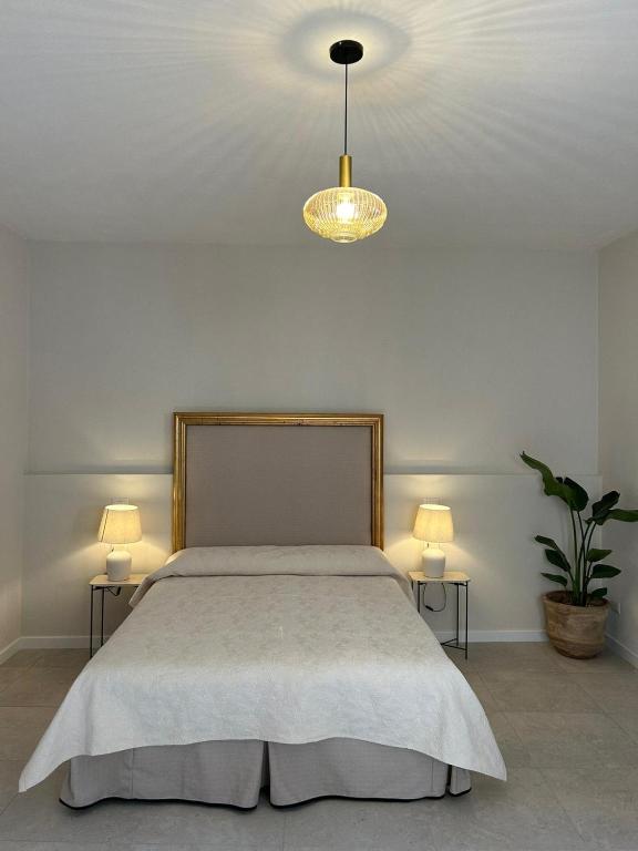 Postel nebo postele na pokoji v ubytování NOTUS Rooms Adults Only