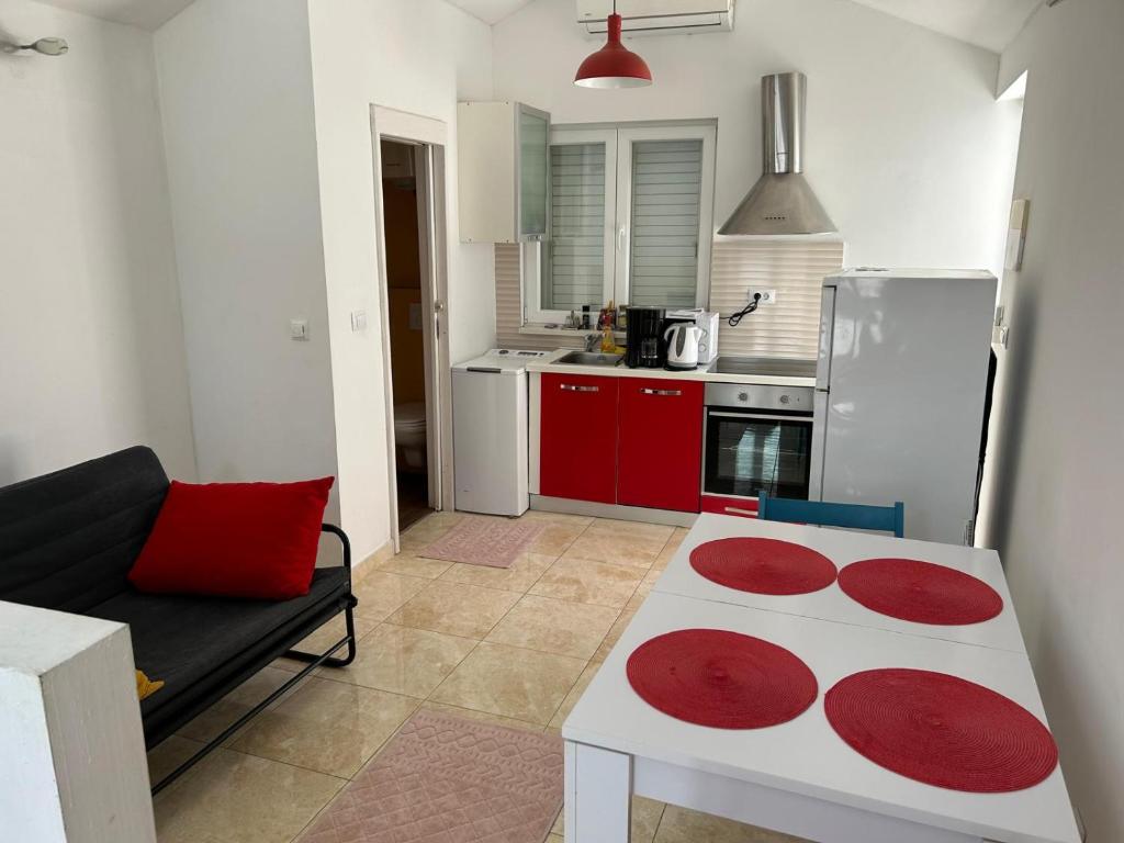 Kuchyňa alebo kuchynka v ubytovaní Apartment Roby