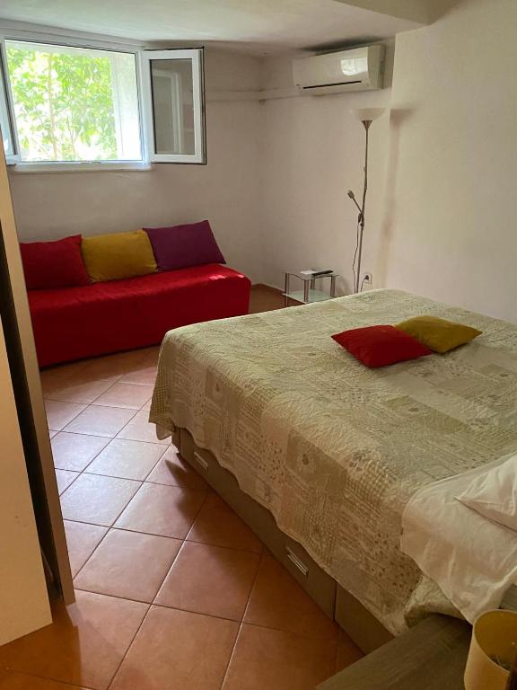 Posteľ alebo postele v izbe v ubytovaní Apartment Roby