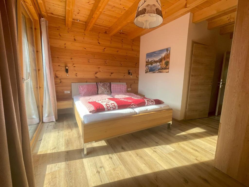 Postel nebo postele na pokoji v ubytování Chalet Traumblick