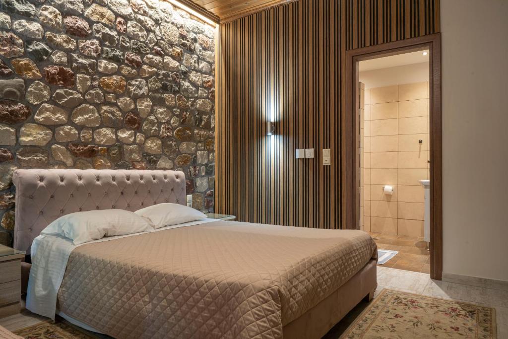 Postel nebo postele na pokoji v ubytování Liontos Rooms
