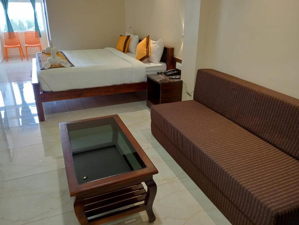 Postel nebo postele na pokoji v ubytování Ketti Heights Resorts