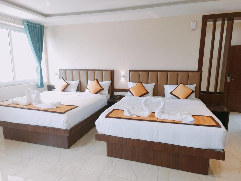 Postel nebo postele na pokoji v ubytování Ketti Heights Resorts