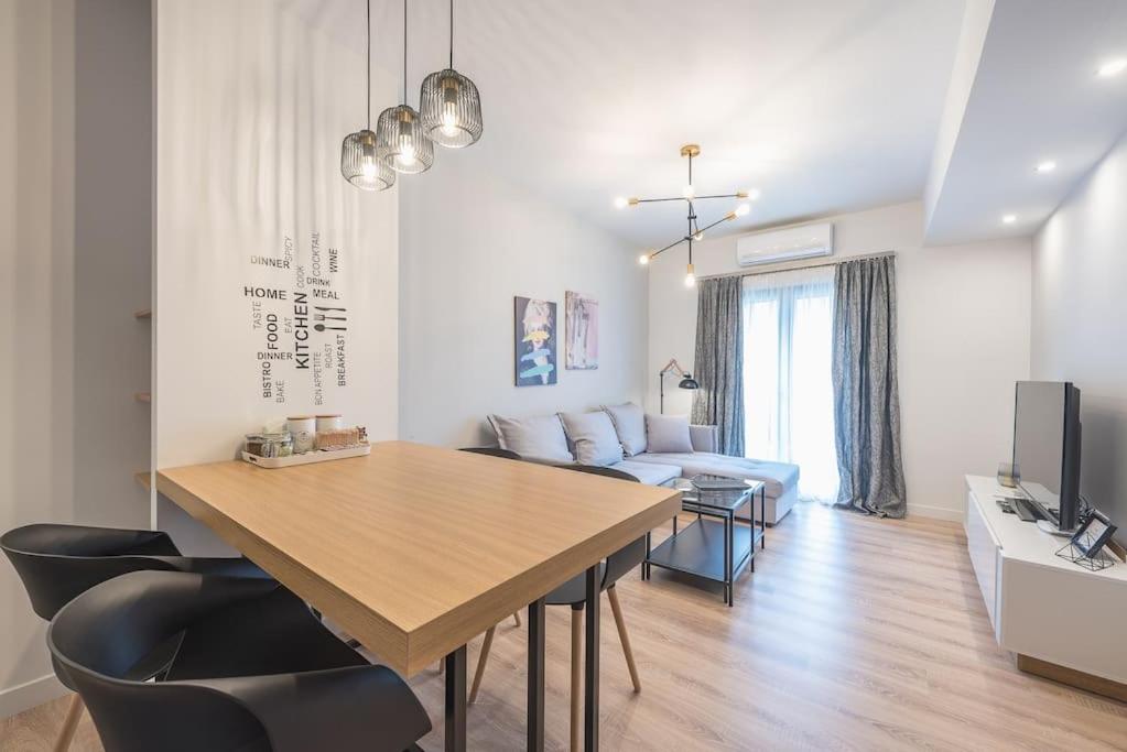 TV a/nebo společenská místnost v ubytování Modern Apartment