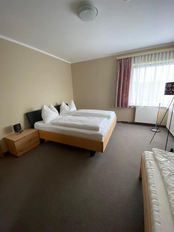 Postel nebo postele na pokoji v ubytování Haus Panorama