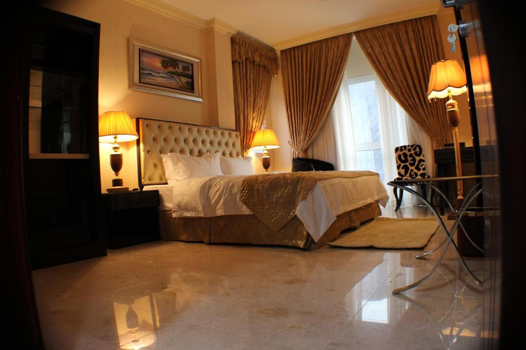 Postel nebo postele na pokoji v ubytování Pioneer Hotel Apartments Muscat