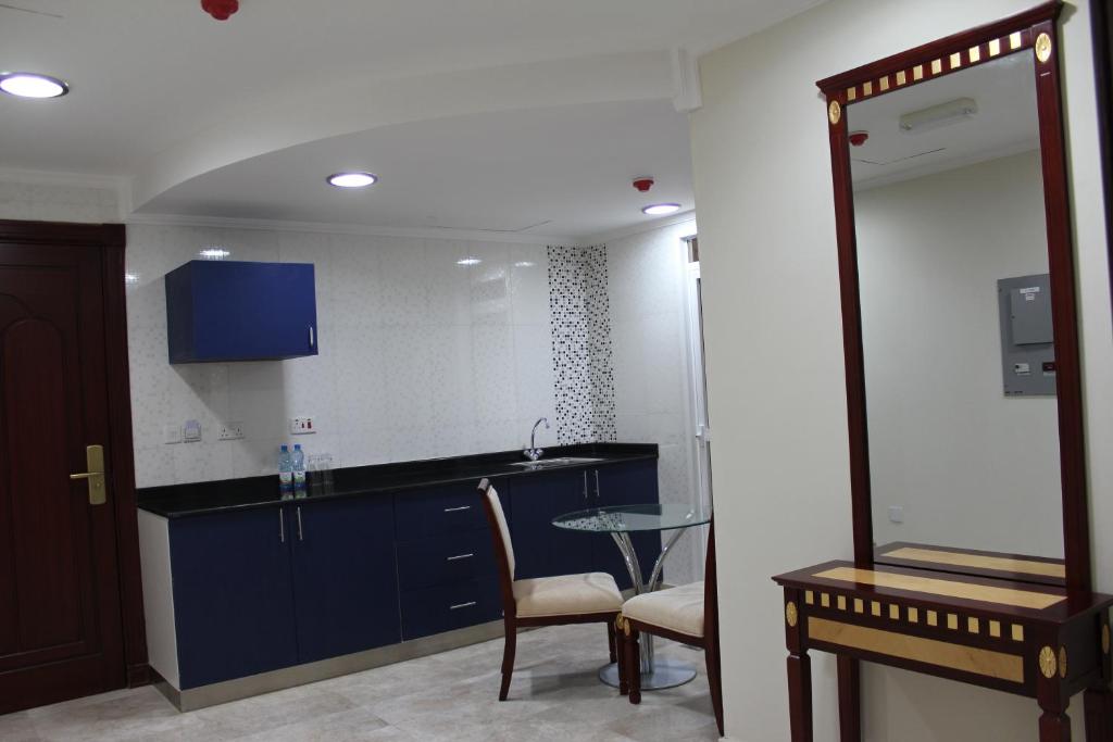 TV a/nebo společenská místnost v ubytování Pioneer Hotel Apartments Muscat