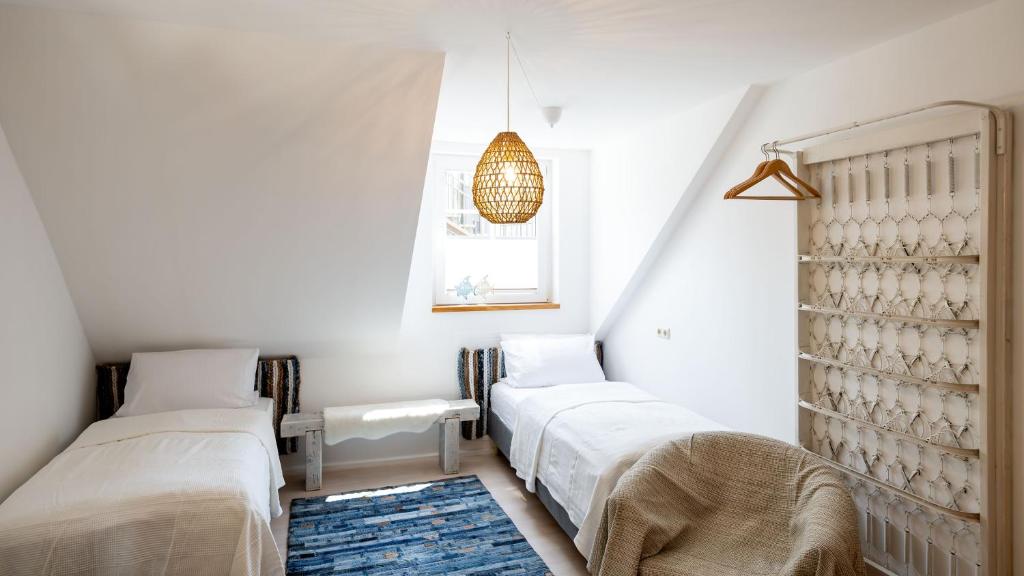 Postel nebo postele na pokoji v ubytování Rathener Hof by STEIGER Hotels