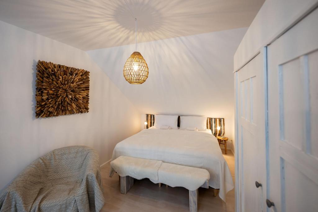 Postel nebo postele na pokoji v ubytování Rathener Hof by STEIGER Hotels