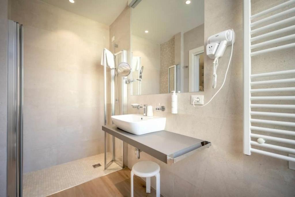 Koupelna v ubytování Hotel Le Lampare