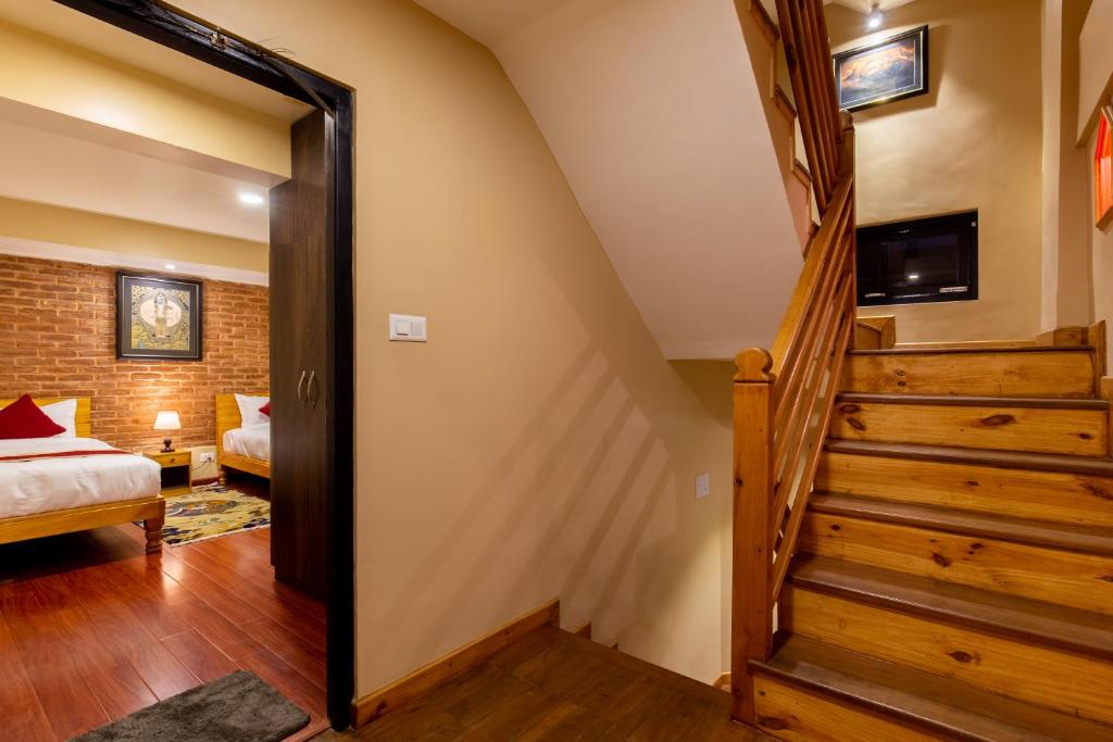 Postel nebo postele na pokoji v ubytování vajra house