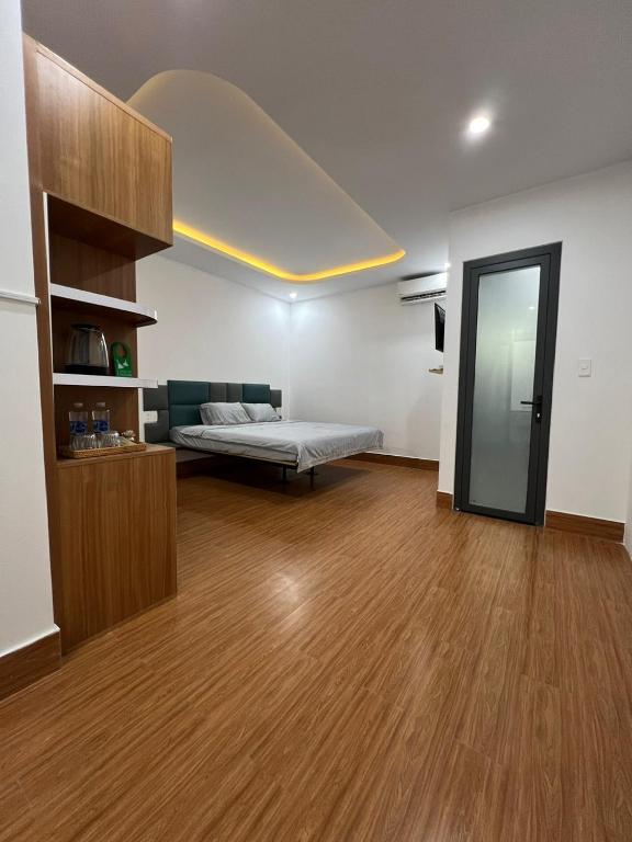Postel nebo postele na pokoji v ubytování Oasis Homestay