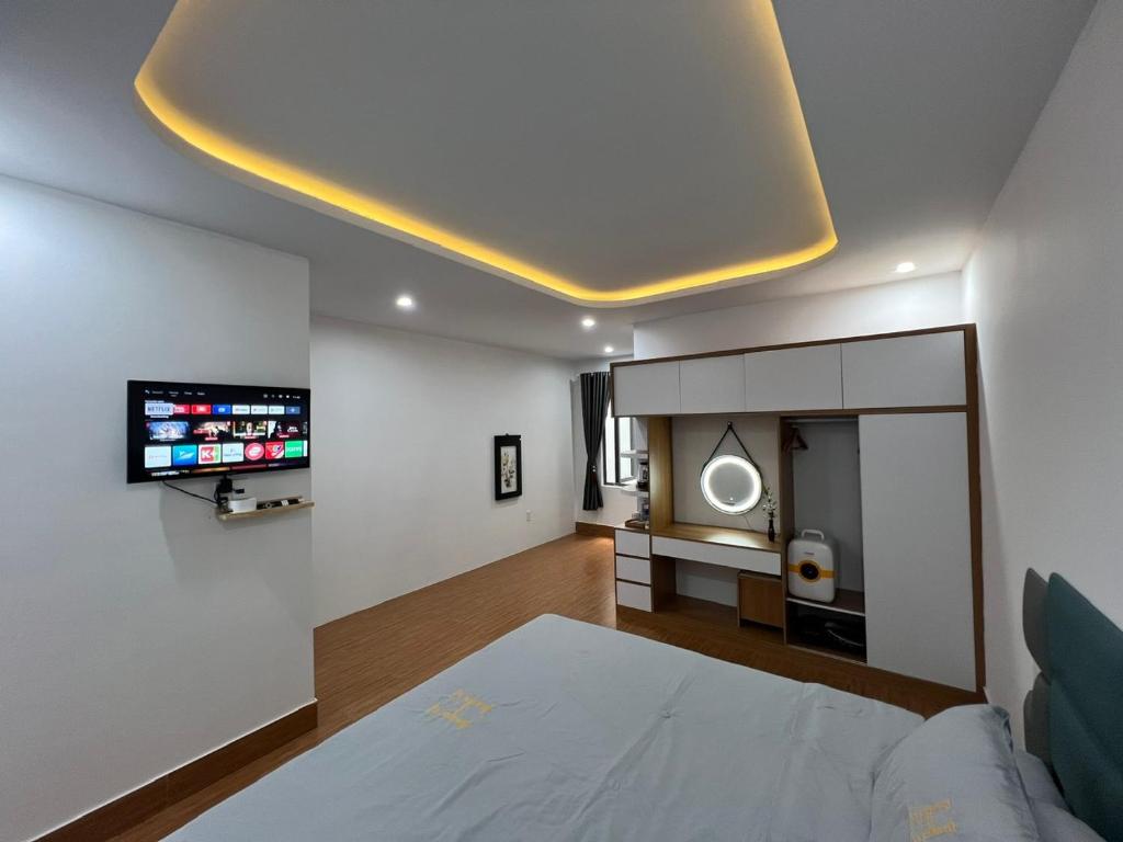 TV a/nebo společenská místnost v ubytování Oasis Homestay