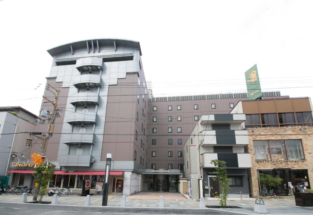 a building on a city street with at Nara Washington Hotel Plaza in Nara