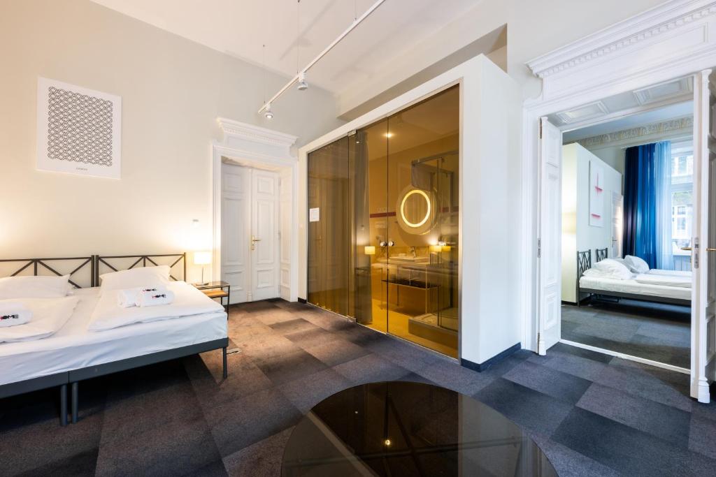 Posteľ alebo postele v izbe v ubytovaní Home Aparthotel