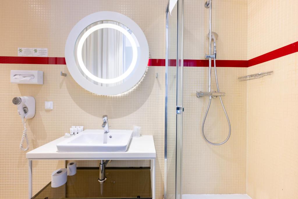 Kúpeľňa v ubytovaní Home Aparthotel